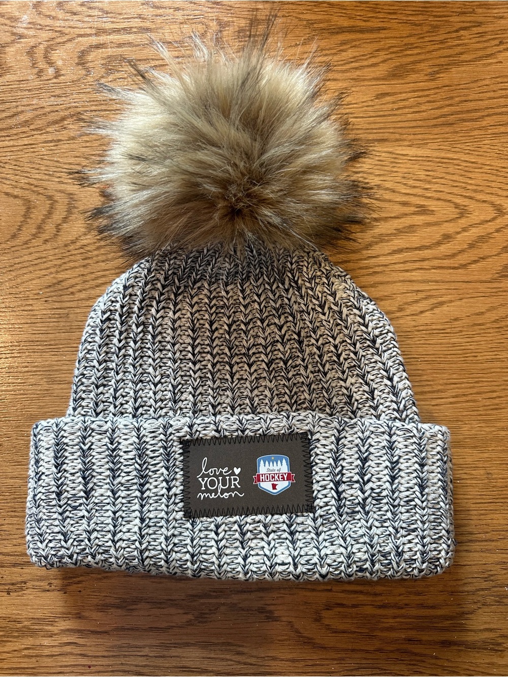 Love Your Melon State of Hockey knit Beanie with Faux Fur Pom